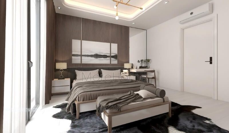 Giường hiện đại gỗ óc chó kết hợp với tranh canvas trên nền gỗ ốp tạo nên một không gian ngủ thư thái và đẹp mắt.